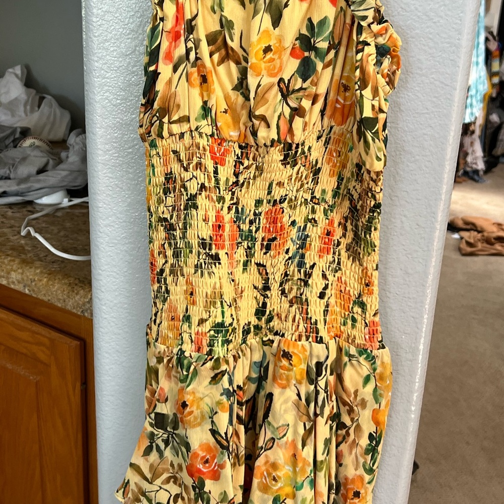 rays for Days yellow floral romper with built in shorts